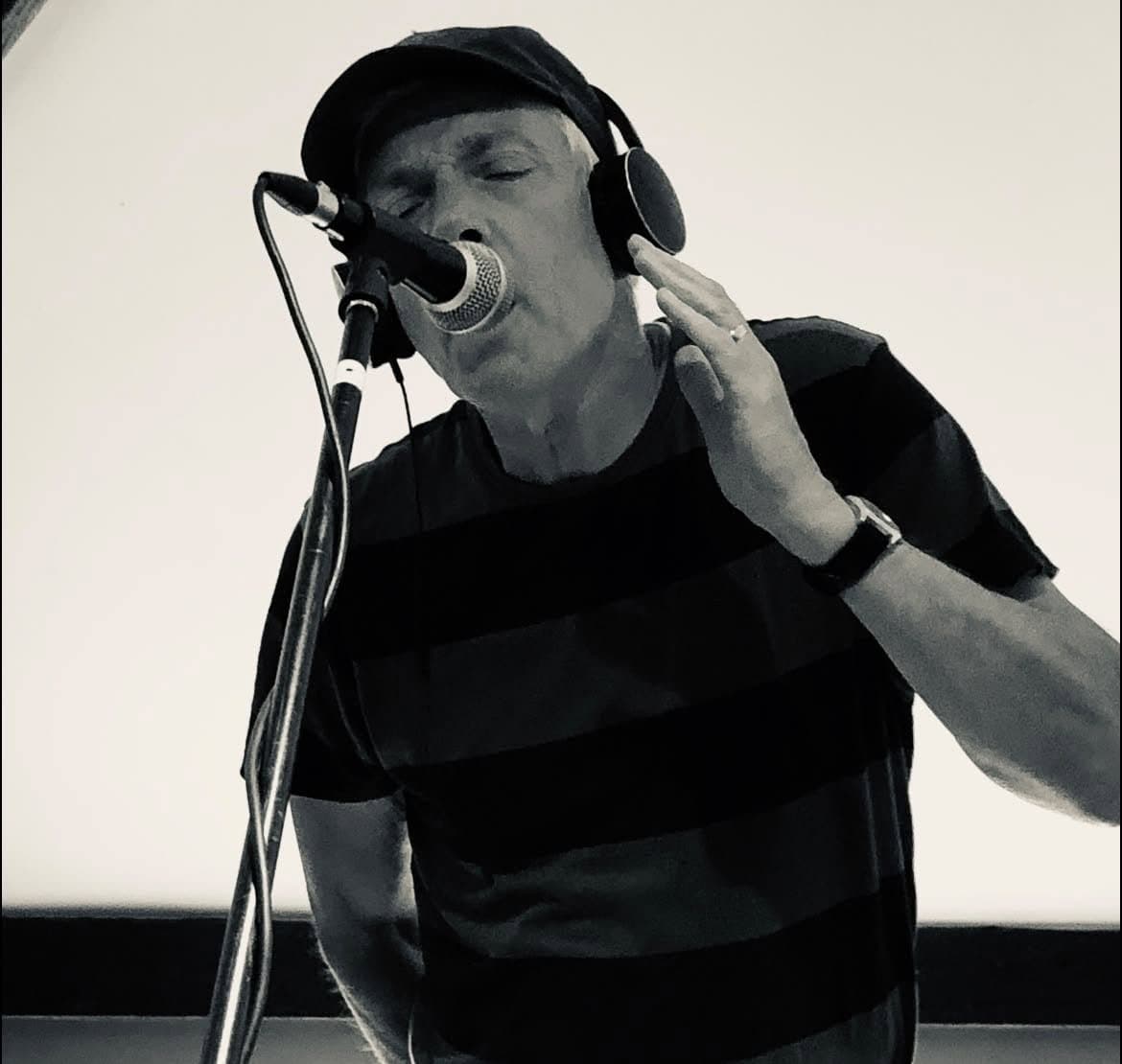 Brian singing in the studio while recording the EP